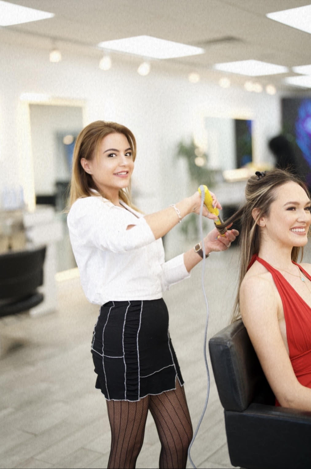 Nardeen styling a client at Nardeen Hair Studio